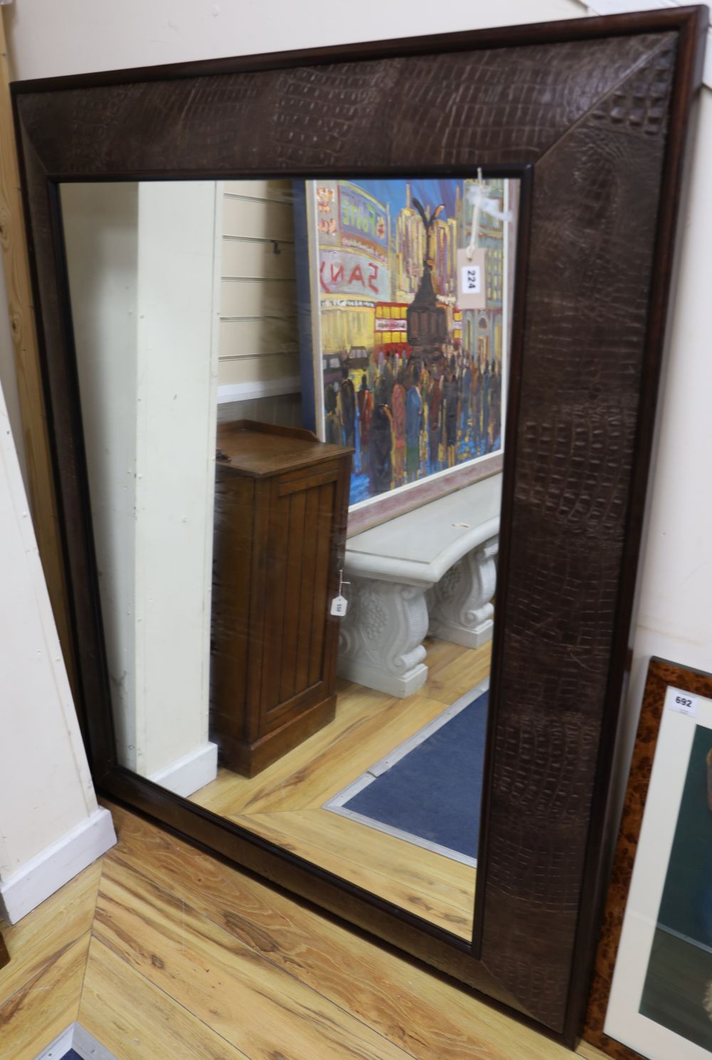An Andrew Martin faux crocodile rectangular wall mirror, width 116cm height 148cm